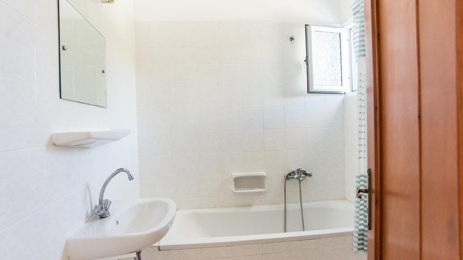 Blue White Apartments Two Bedroom Apartment Bathroom